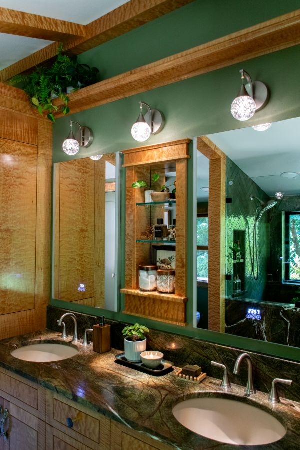 Custom curly maple vanity with marble countertop and dual sinks.