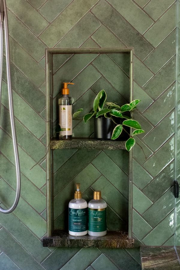 Vertical shower wall niche.