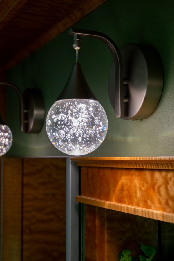 Wall sconces look like rain drops.