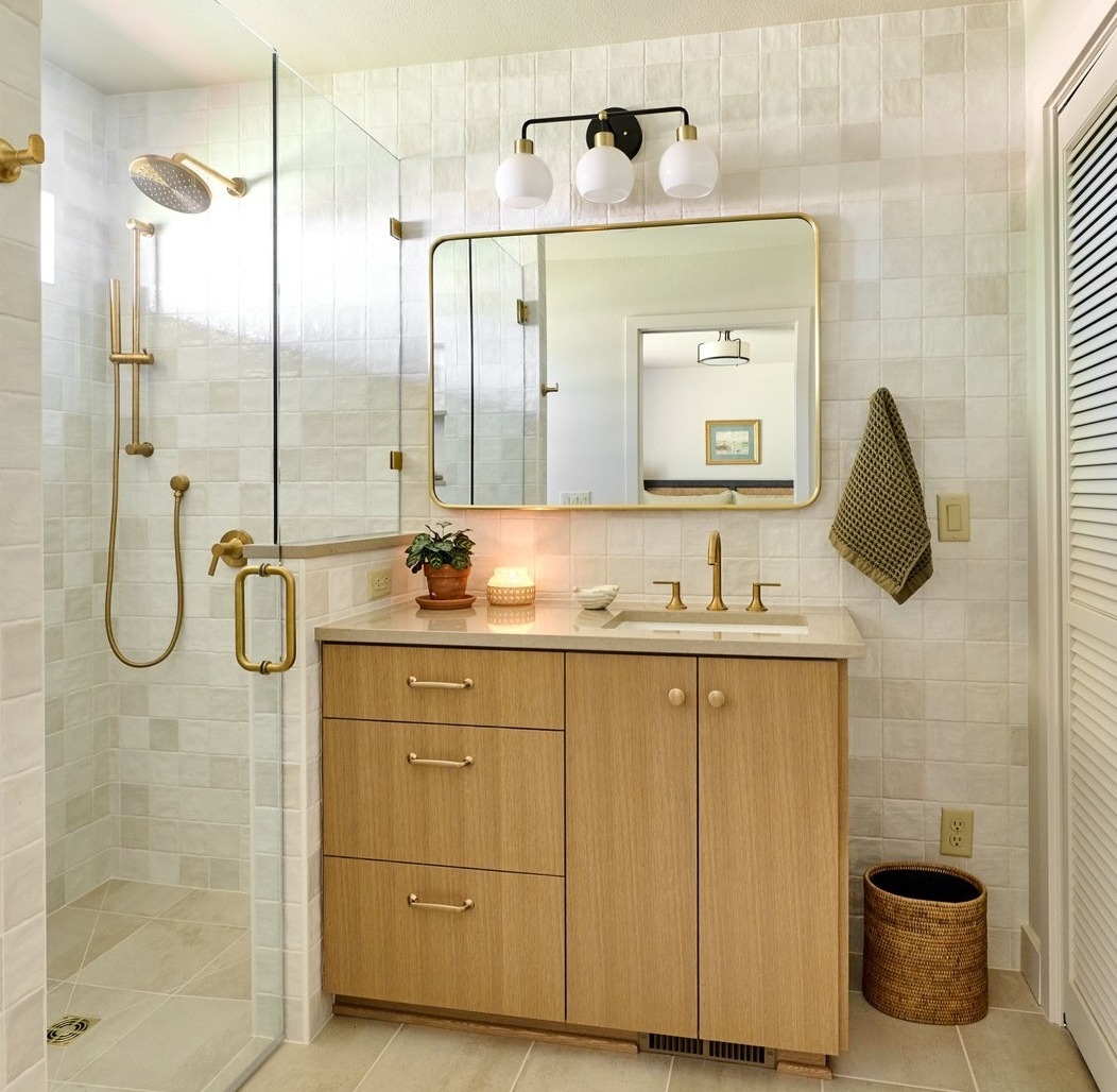 Zellige tile brings warmth to this guest suite bath by Powell Construction